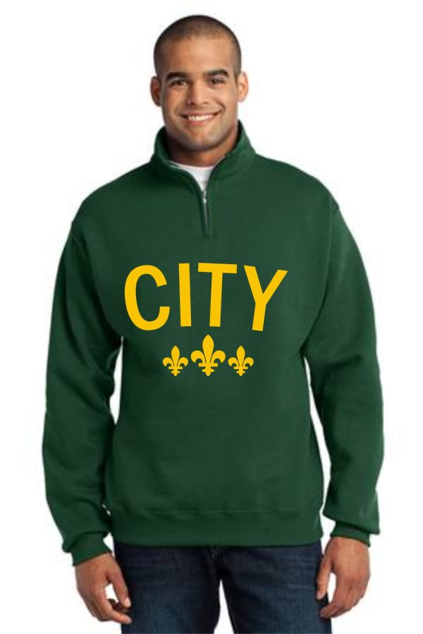 Man wearing a green sweatshirt with "CITY" written on it.