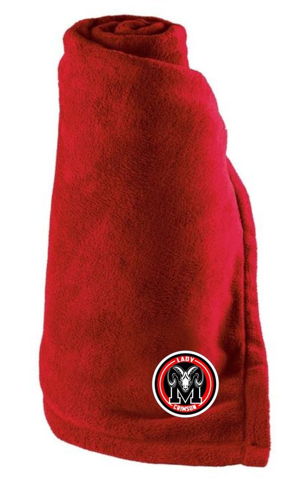 Manual Lady Crimson Soccer Tailgate Blanket Aug 223856 with a Miami University logo embroidered near the bottom, rolled up and standing vertically.