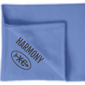 Blue square fabric with a folded corner, featuring the Harmony XC Embroidered Fleece stadium blanket BP78 logo with an oval and leaf motif in gray.