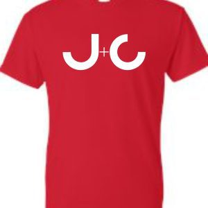 Red T-shirt with white J+C logo.