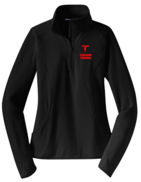 Black sports jacket with a quarter zip, featuring a red "Thomson Training Ladies 1/2 zip pullover LST850" logo on the left chest area.