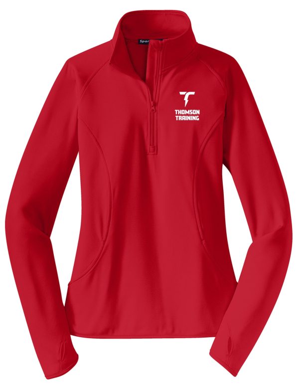 Thomson Training Ladies 1/2 zip pullover LST850 with a zippered front and the “thomson training” logo on the left chest, displayed on a plain background.