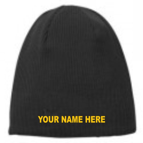 Black knit beanie with yellow text.