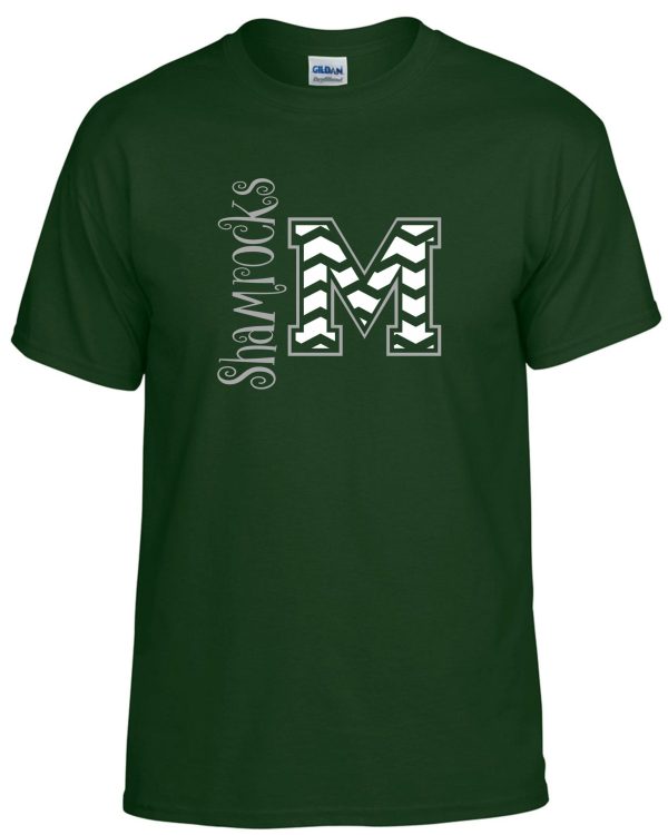 St Martha Shamrock Chevron M Spirit T-shirt with a large white and green letter 'm' and the word "shamrocks" curved above it in white, displayed on a plain background.