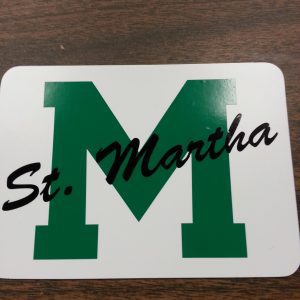 St. Martha green M on white sign.