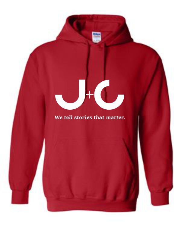 Red hoodie with white J+C logo.