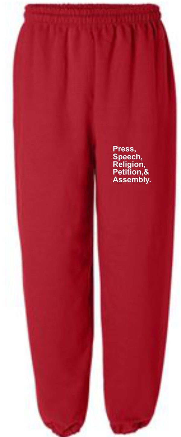 Red sweatpants with First Amendment text.